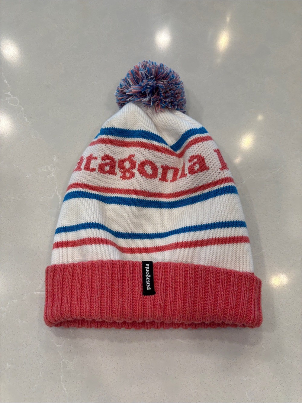 Patagonia White Beanie with Pink Cuff and Blue Stripes